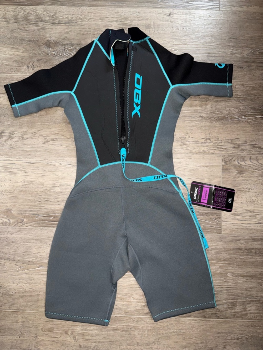 DBX Women’s  Short-Sleeve Swim Neoprene Rashguard in Gray with Teal Trim